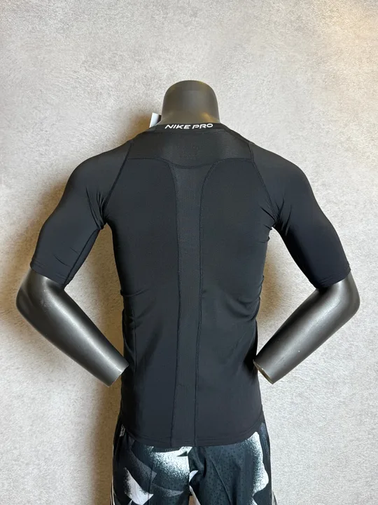 View 3 of Black Short Sleeve Compression Shirt · Style 101