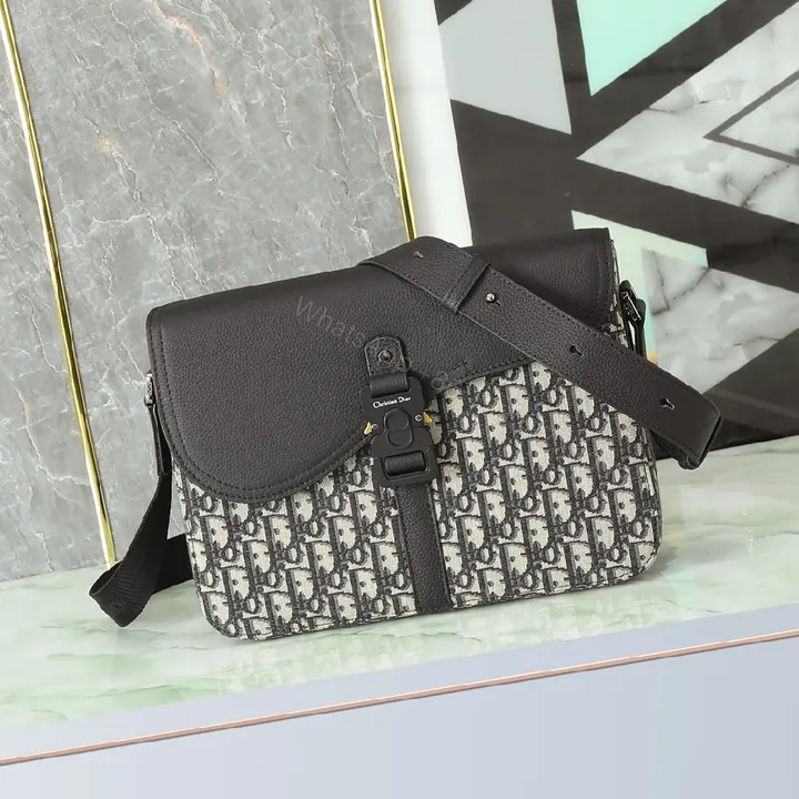 View 1 of Texture-Black Leather & Canvas Crossbody with Monogram Pattern, Compact, Everyday Luxury Bag