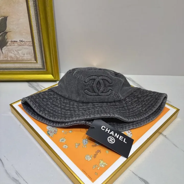 View 1 of Dark Denim Bucket Hat with Interlocking Logo, Lux Style