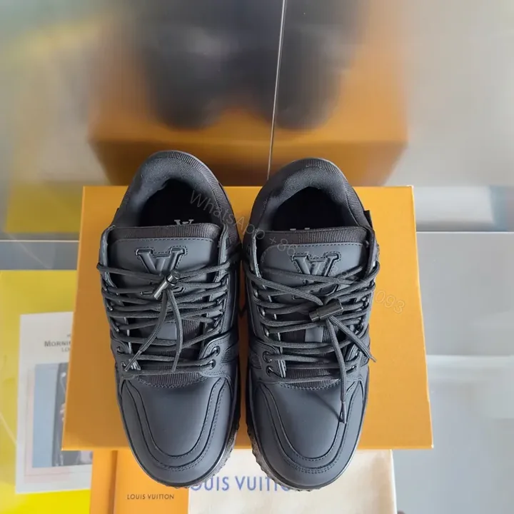 View 1 of Monochrome LV-Influenced Leather Sneakers: Sleek, Durable