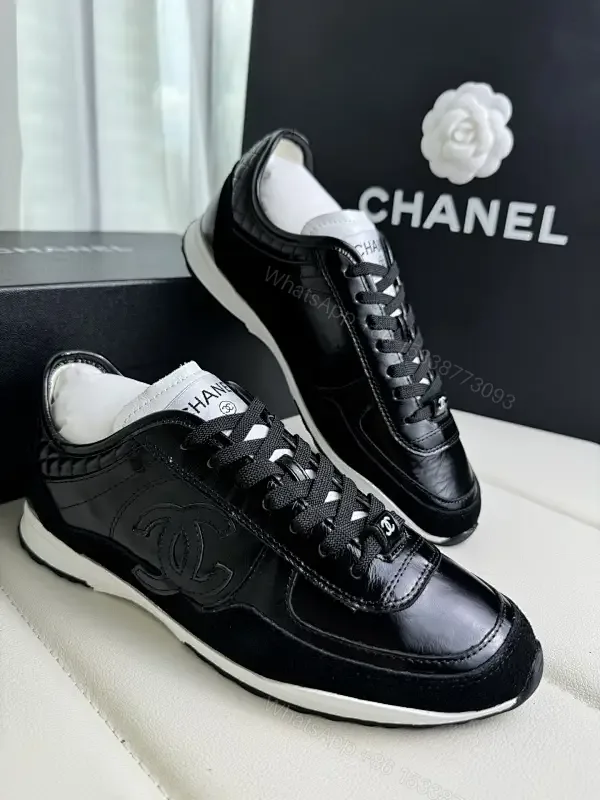 View 1 of Chic Black Leather Trainer — Luxury Comfort, Subtle Logo