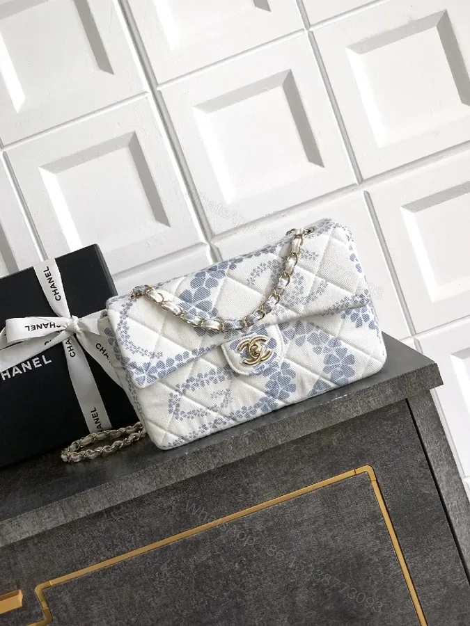 View 1 of Quilted Silk Mini Bag: Floral Luxury, Day-to-Night Versatility