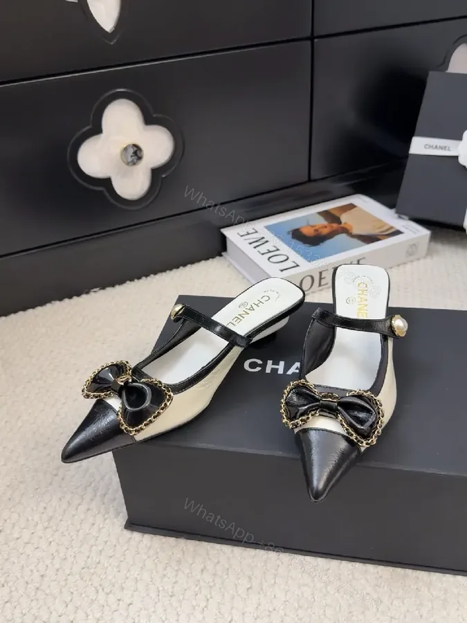 View 1 of Chic Ivory-Black Pearl-Trim Bow Pointed-Toe Mules