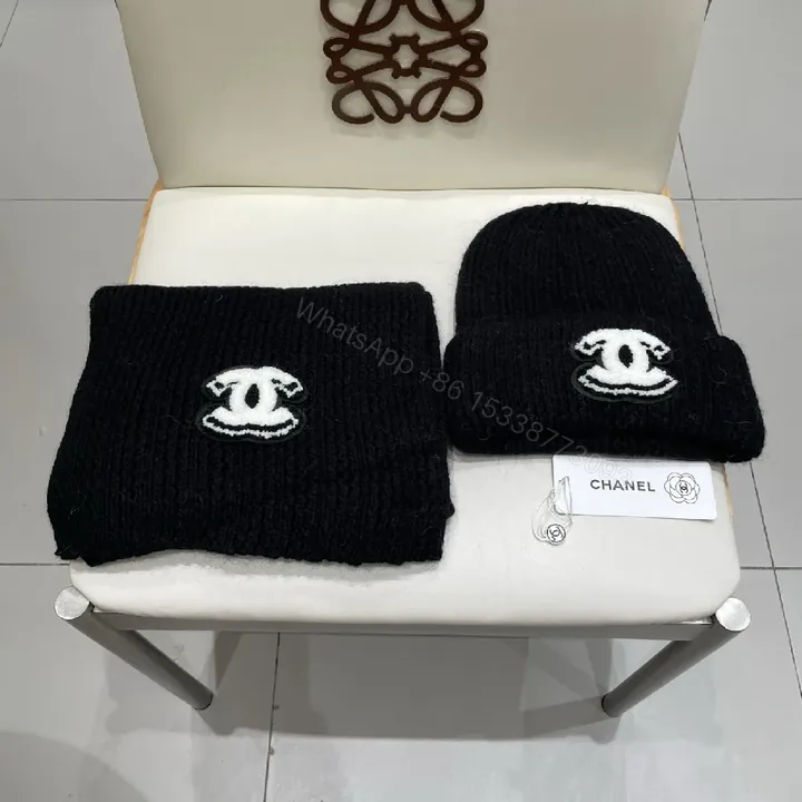 View 1 of Luxe Black Knit Set: Beanie & Scarf with Emblem