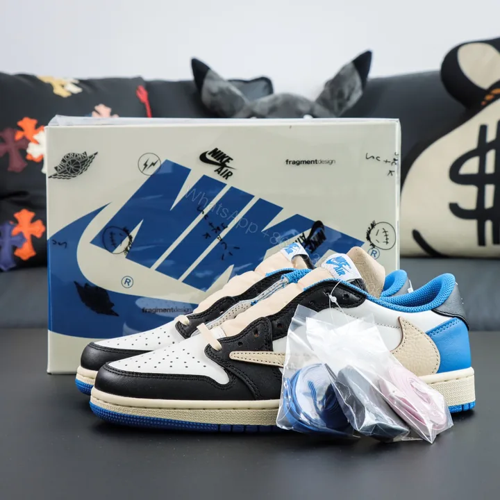 View 1 of Travis Scott Fragment Design Jordan 1 Reps Low​