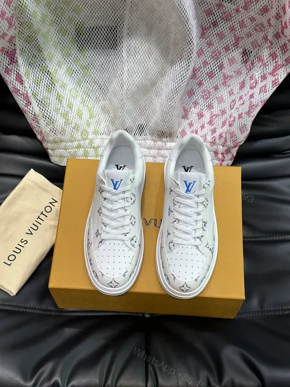 View 1 of Louis Vuitton-Style White Leather Sneakers with Signature Details