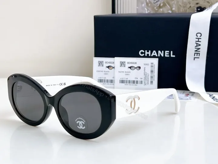 View 1 of Bold Curve Sunglasses: Black/White Acetate, Oversized Cat-Eye