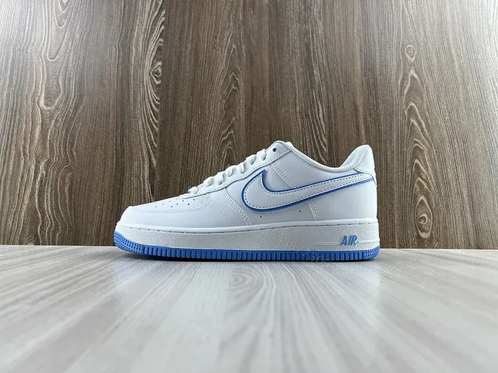 View 1 of White & Blue Minimalist Leather Sneaker â€“ Low-Top Comfort