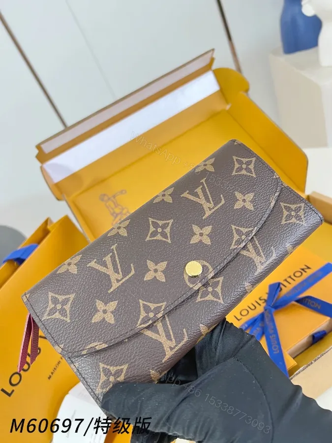 View 1 of Monogram Canvas Slim Wallet with Gold-Hardware Details