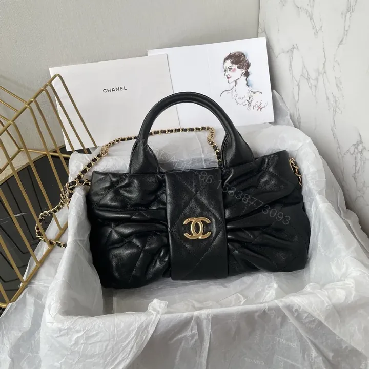 View 1 of Quilted Black Leather Handbag with Gold Hardware - Chic Style