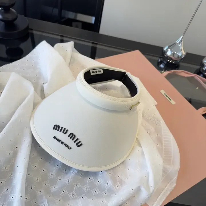 View 1 of White Visor, Black Trim, Sporty Style, Adjustable Back Strap, Miu Miu Visor