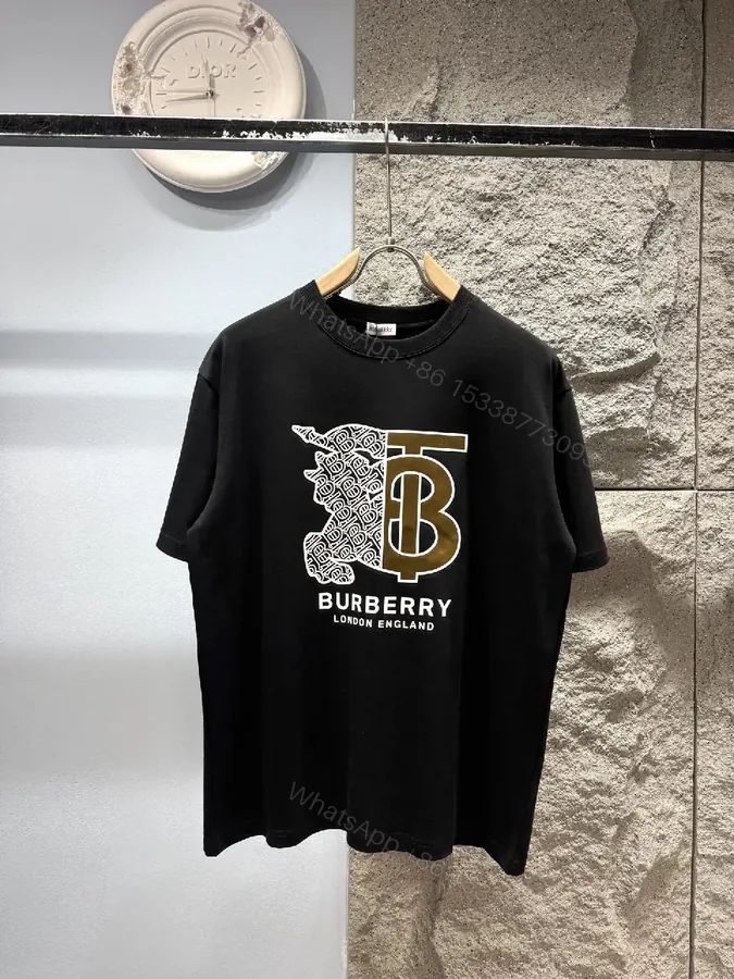 View 1 of Statement Black Cotton Tee with Bold Metallic Logo Detail
