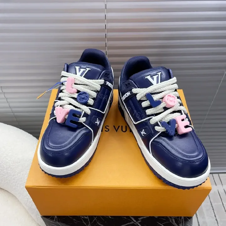 View 1 of Navy Leather High-Top Sneakers with Charms and LV-Inspired Accents