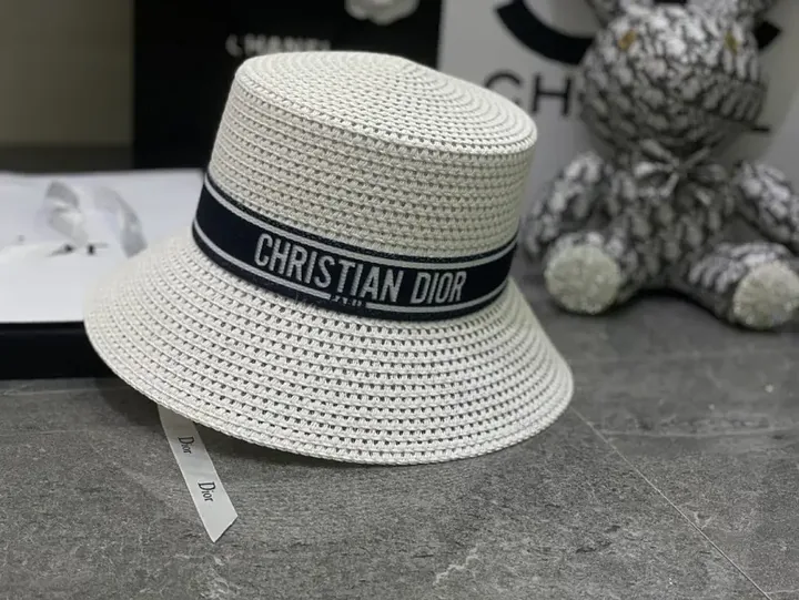 View 1 of Light Beige Straw Bucket Hat with Navy Band