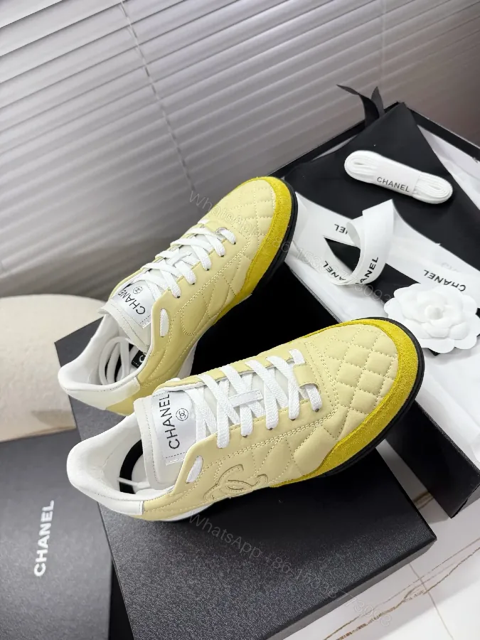 View 1 of Quilted Yellow Suede Low-Top Sneakers: Luxe Streetwear Style