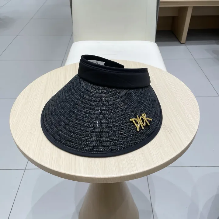 View 1 of Black Straw Visor + Handwoven Straw + Luxe + Gold Dior Accent + Visor