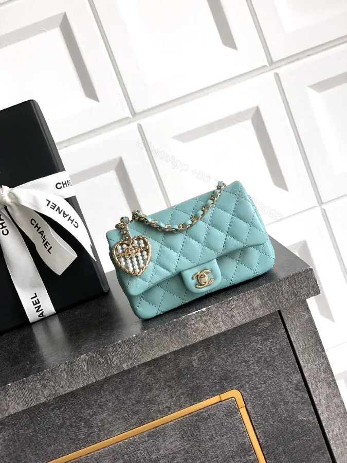 View 1 of Pastel Aqua Quilted Mini Bag with Pearl Charm (Chic)