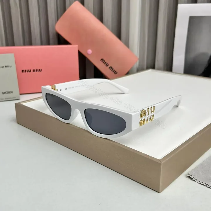 View 1 of Miu Miu Cat Eye White Sunglasses Women