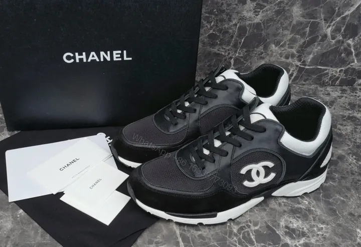 View 1 of Black & White Leather-Luxe Sneaker: Subtle Designer Comfort