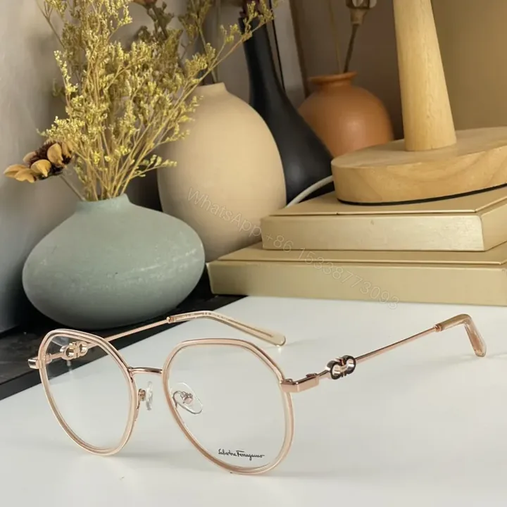 View 1 of Ferragamo Rose-Gold Round Frames with Gancini Details