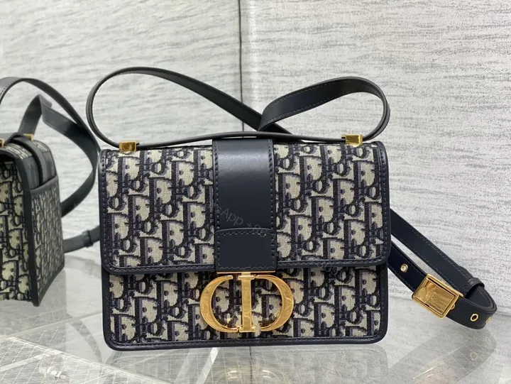 View 1 of Compact Monogram Crossbody with Luxe Gold Hardware