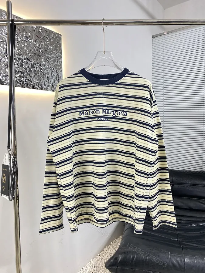 View 1 of Navy Stripe Cotton Crewneck Sweater with Subtle Logo