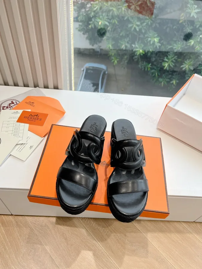 View 1 of Hermes Women Black Leather Slip-On Sandals