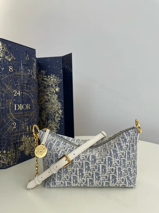 View 1 of Denim-Texture Mini Bag with White Leather Strap Signature Chic Luxury