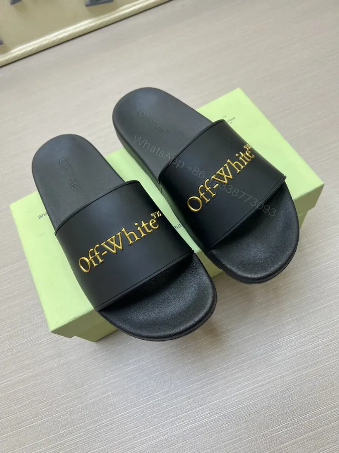 View 1 of Chic Faux-Leather Slide Sandals with Gold Logo Comfort