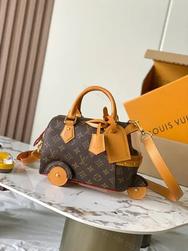 View 1 of Dark Brown LV Monogram Mini Luggage Bag on Wheels