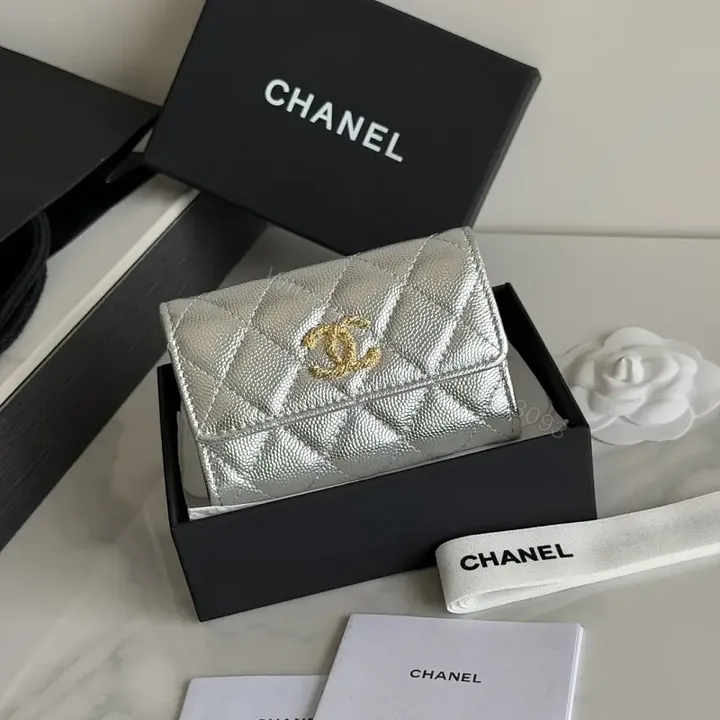 View 1 of Metallic Silver Leather Quilted Flap Wallet, Compact Bi-fold with Gold CC Logo