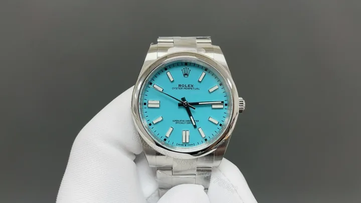 View 1 of Rolex Oyster Perpetual 41 124300 Turquoise Dial Watch 124300-006