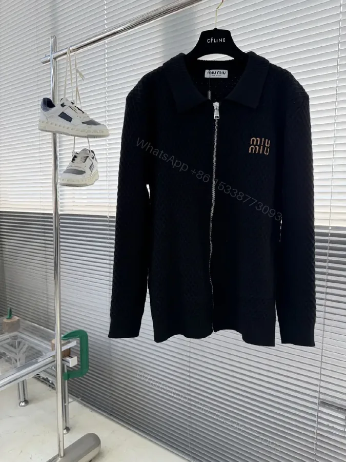 View 1 of Black Quilted Zip-Front Jacket with Subtle Logo, Standout Luxe Utility