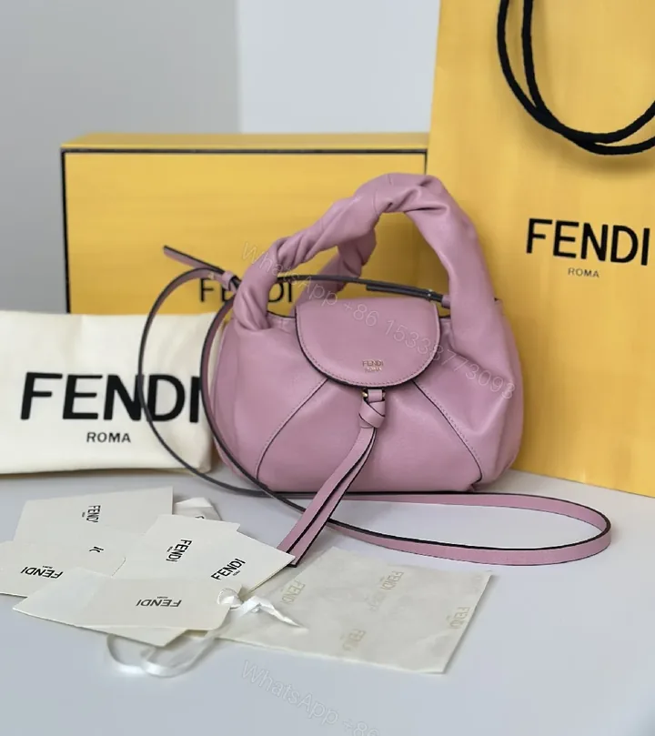 View 1 of Soft Pink Pebbled Leather Mini Satchel – Crossbody Style, Tassel Detail