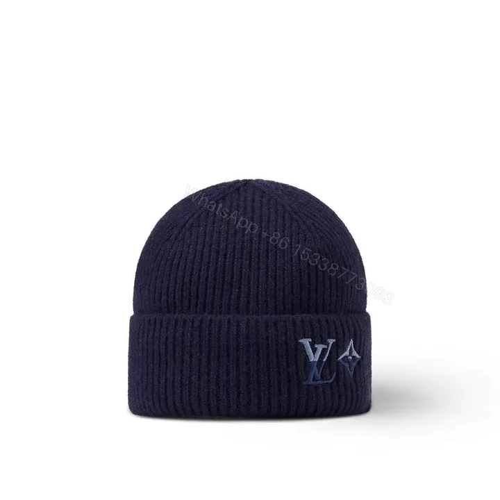View 1 of Navy Knit Beanie with Subtle LV Emblem, Classic Style