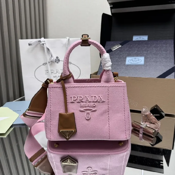 View 1 of Chic Pink Canvas Mini Bag with Textured Finish and Hardware
