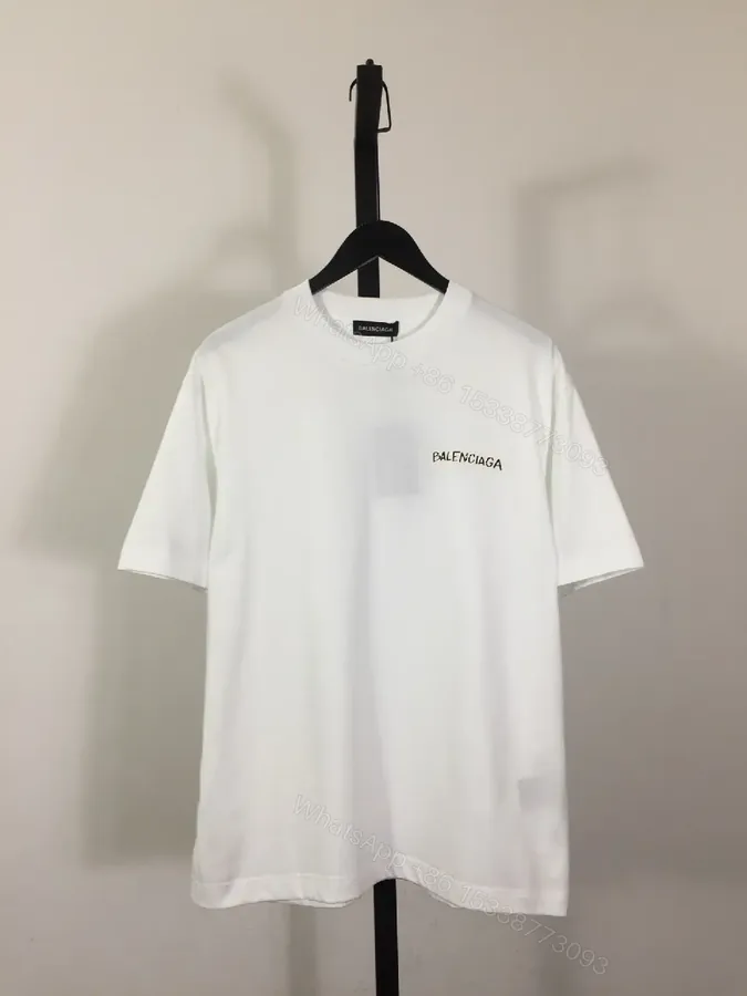 View 1 of Minimalist White Tee with Luxe Subtle Logo – Modern Essential T-Shirt
