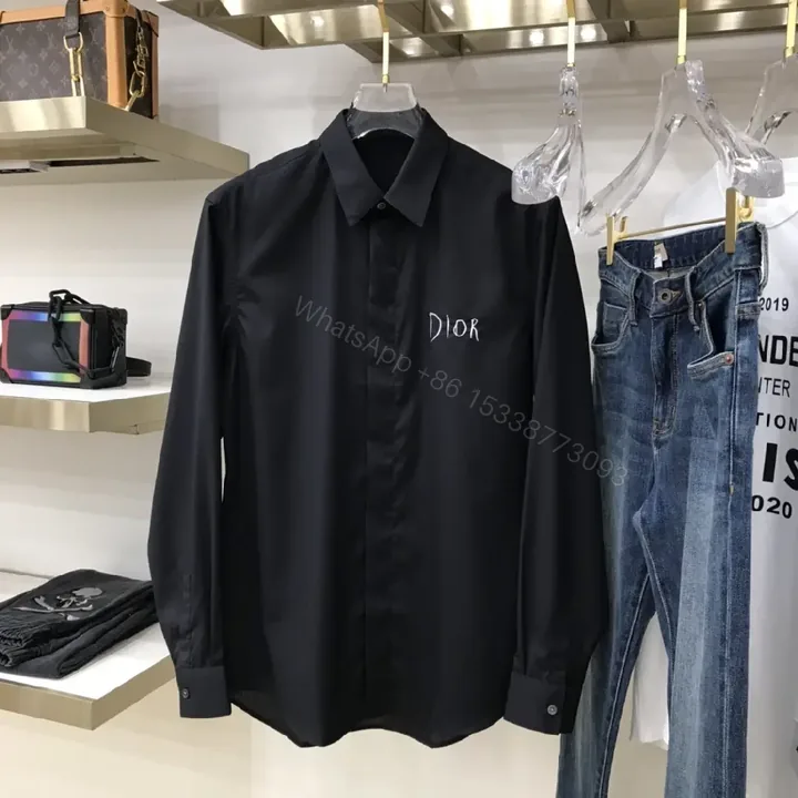View 1 of Minimal Black Shirt Jacket with Subtle Logo Button Front