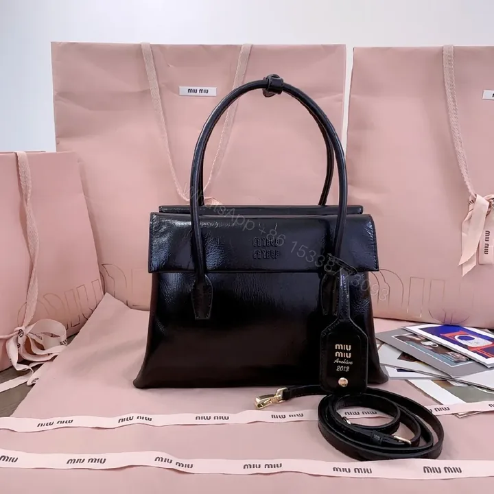 View 1 of Structured Leather Satchel: Sleek, Timeless Luxury Bag