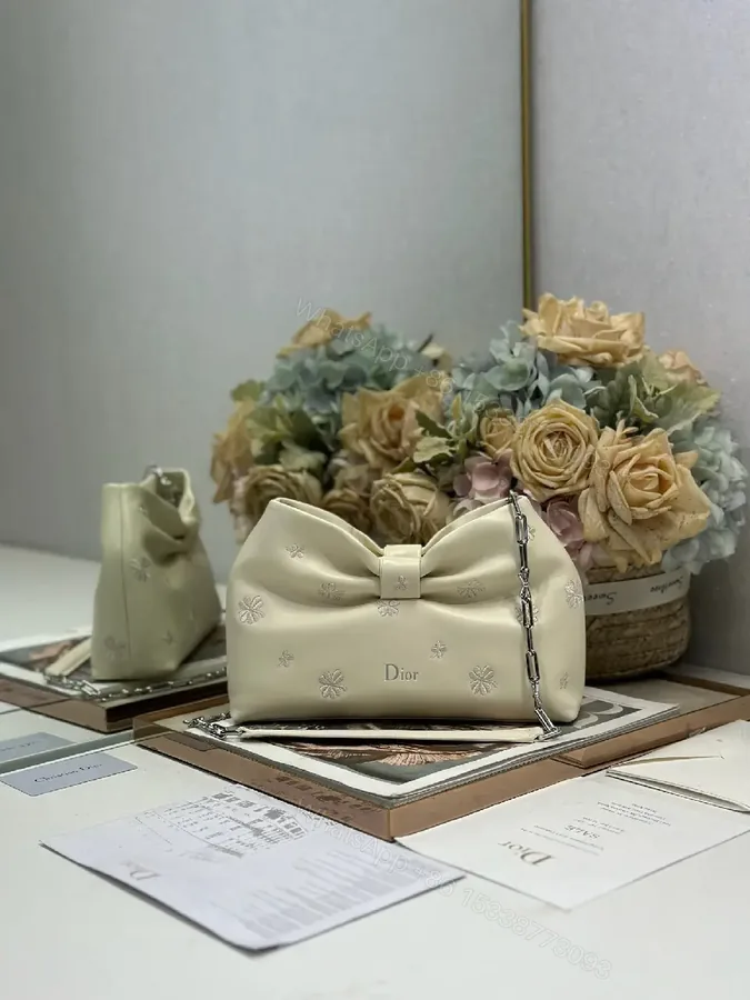View 1 of Chic Nappa Leather Mini Handbag with Bow Embroidery