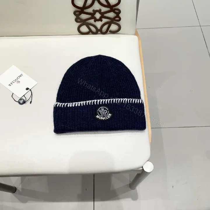 View 1 of Navy Knit Beanie with Contrast Stitch, Fold-Over Cuff