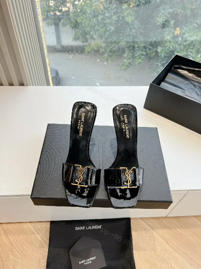 View 1 of Glossy Black Patent Heels with Gold Hardware Mules