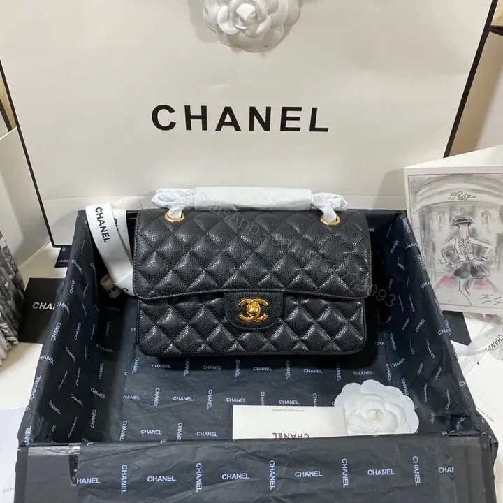 View 1 of Black Quilted Leather Flap Bag: Structured Luxe Style, Gold Hardware