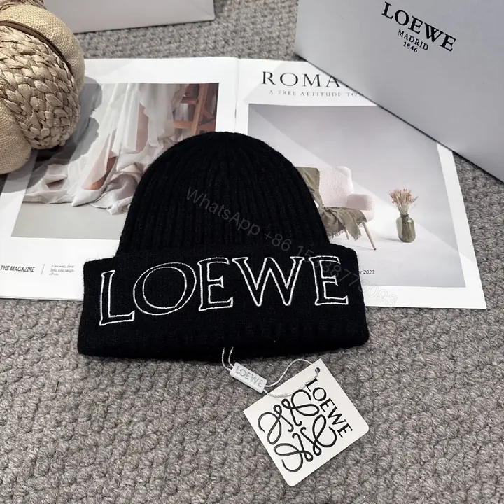 View 1 of Black Knit Beanie + Premium Knit + Chic Minimalist + LOEWE Logo Statement + Beanie