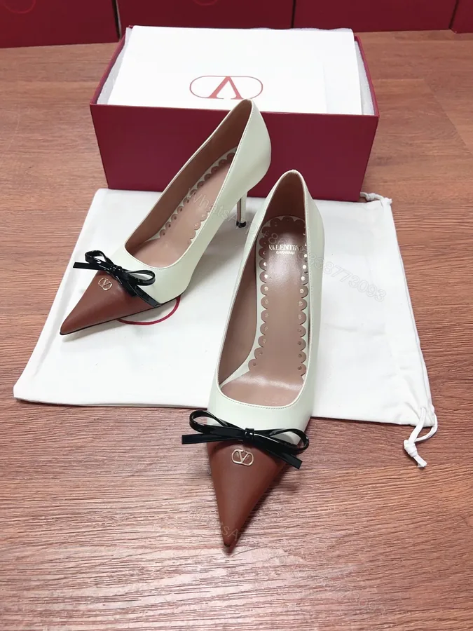 View 1 of Valentino Women White Leather Brown Bow Detail Pumps