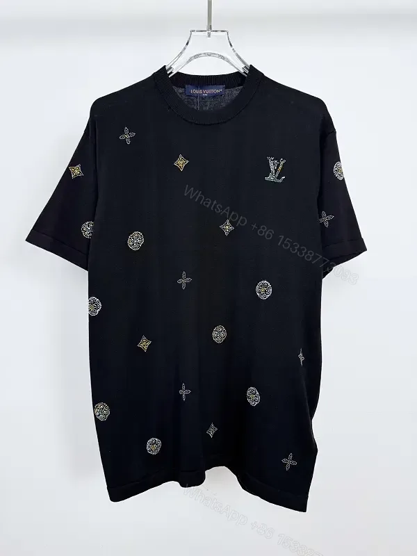 View 1 of Black Knit + Luxe Embellished + Modern Short-Sleeve + Signature Motifs + Knit Top