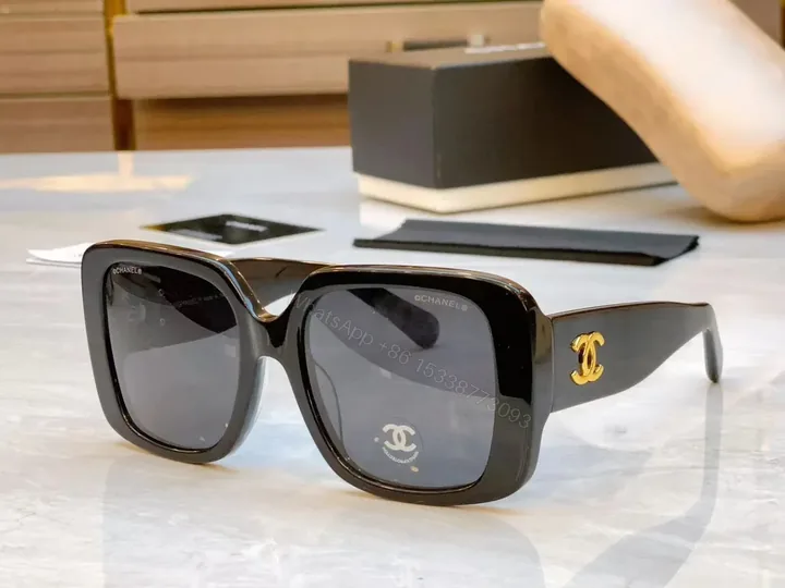 View 1 of Oversized Square Sunglasses - Black Acetate, Gold Logo, UV400 Protection