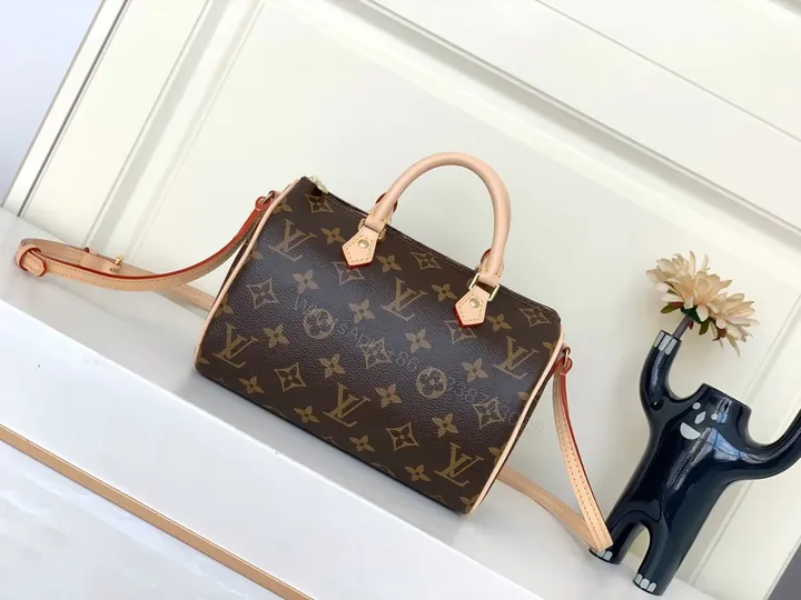 View 1 of Louis Monogram Carry: City-Ready Leather-Trim Handbag