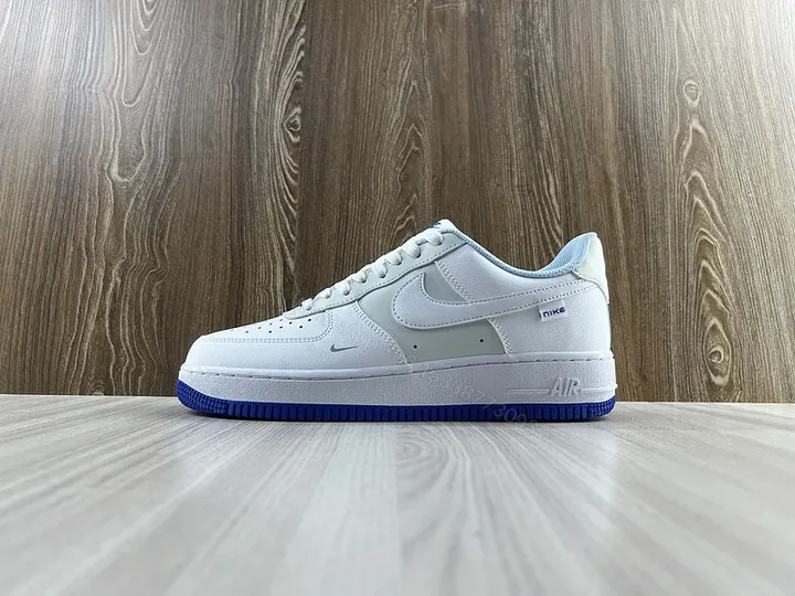 View 1 of Minimal White + Leather + Nike Low-Profile + Ultramarine Outsole Sneaker
