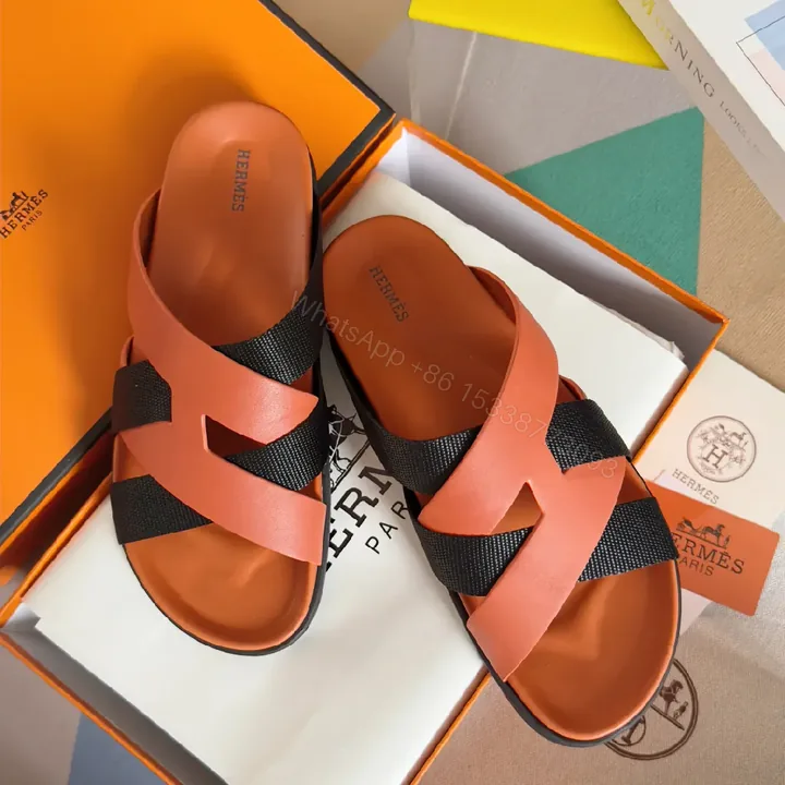 View 1 of Coral-Black Leather Sandals: Sleek Cross-Strap Comfort